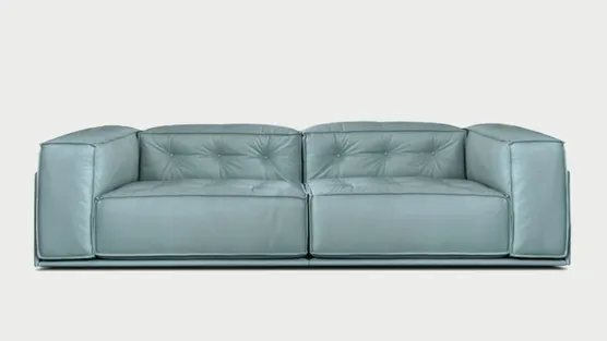 divano in pelle e bottoni Glamour 